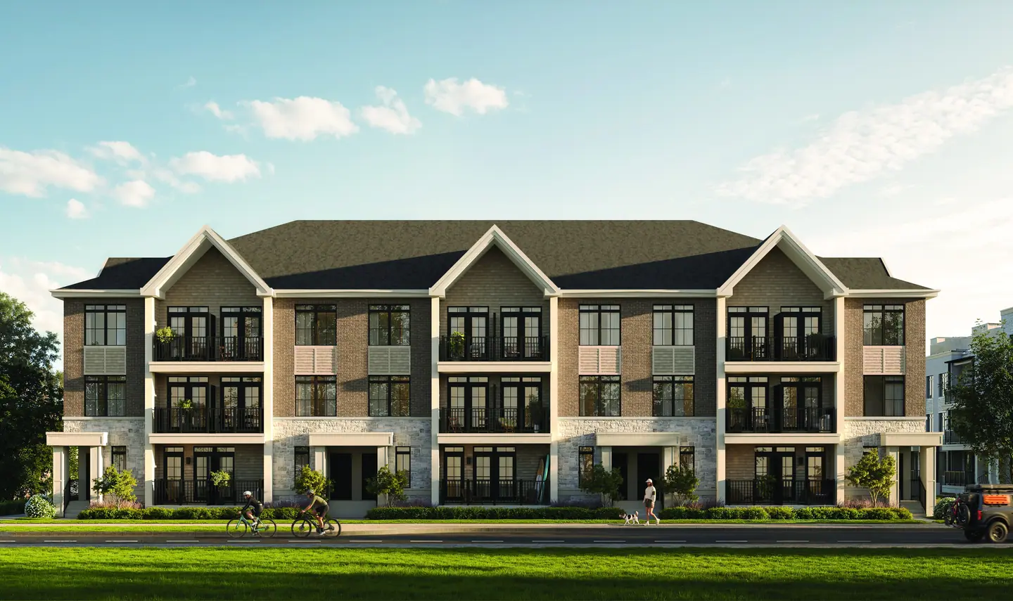 Rendering of South Banks townhomes in Elevation A: three storeys of brick and stone with gabled roofs and black balconies